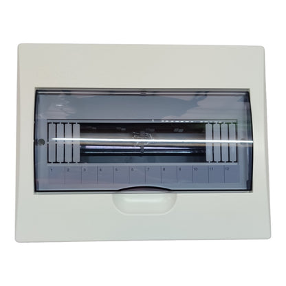 A white electrical distribution board or circuit breaker box with a transparent viewing window showing internal components and numbered terminals from 1 to 12.