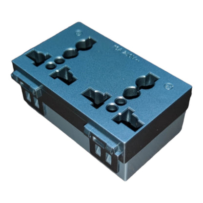 A dark blue-gray plastic electrical terminal block or connector housing with multiple screw terminals and a gray base, shown on a plain white background.