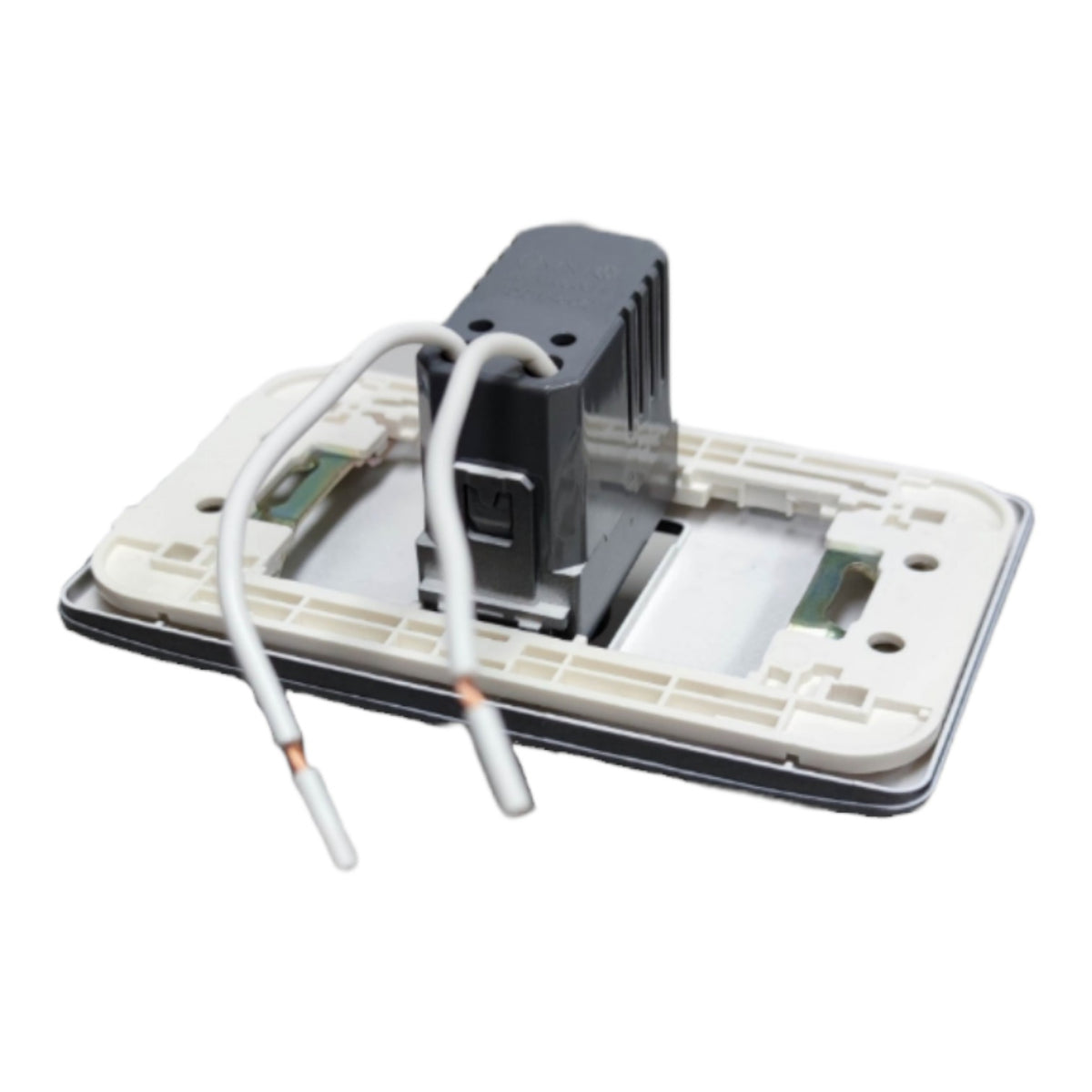 A close-up of a light switch module showing the internal components, including a black central motor or sensor unit, a beige plastic base, and two white wires with bare copper ends, isolated on a white background.