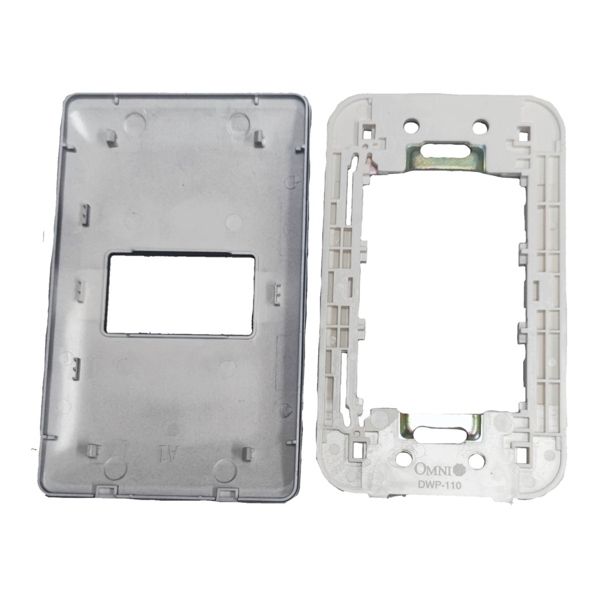 Two plastic electrical wall switch plate frames shown side by side on a white background, one in gray and one in off-white, both with a rectangular cutout in the center.