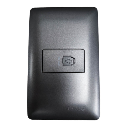 A black plastic electrical outlet cover plate with a recessed battery compartment icon in the center, shown against a plain white background.