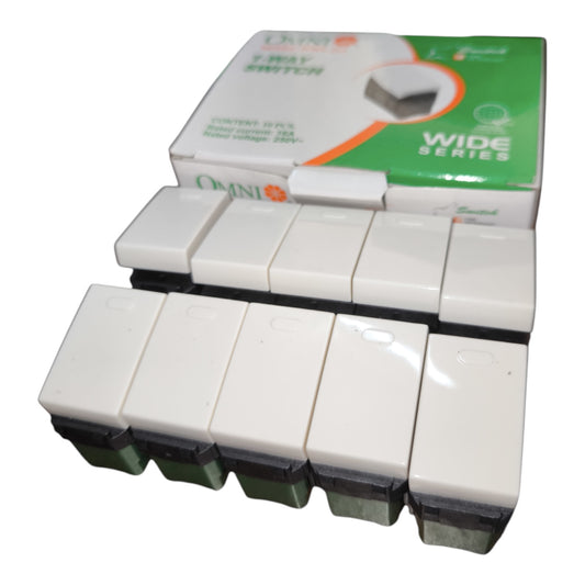 A 7-way wall switch module set from Omni, featuring eight white plastic switch faces with black mounting bases, shown with its green and white retail packaging box.