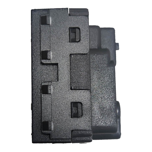 A black textured plastic automotive or industrial component with molded slots and connectors, shown against a plain white background.