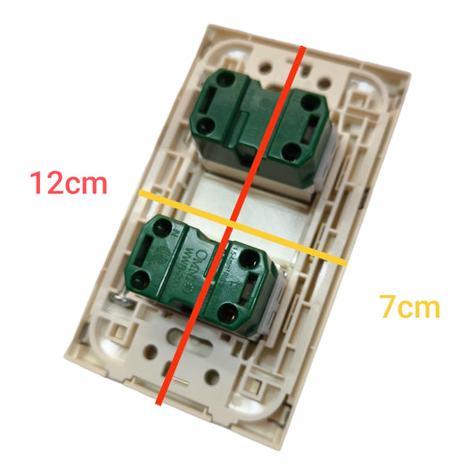 A dual-gang wall switch plate shown from an angled top-down view with overlaid dimension lines and text indicating 12cm width and 7cm height, on a plain white background.