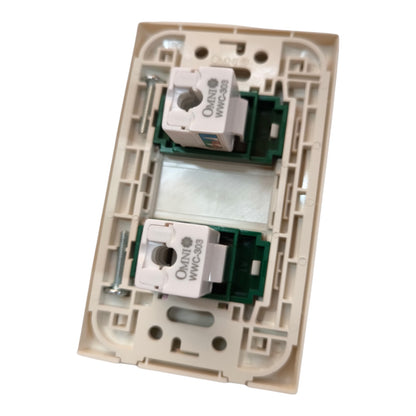 An electrical double switch socket plate with two white sockets mounted on a beige plastic backplate, isolated on a white background.
