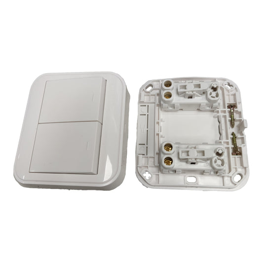 A two-button wall switch plate shown disassembled, with the front cover plate on the left and the internal backplate with screw terminals on the right, photographed on a white background.