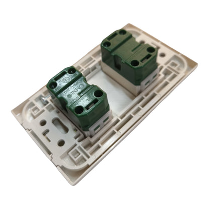 A replacement two-way light switch module featuring two green terminal blocks on a beige plastic base, shown on a plain white background.