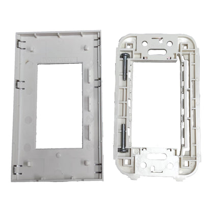 A pair of white plastic electrical wall switch plate frames, one showing the front face and the other showing the back side with mounting holes and a screw.