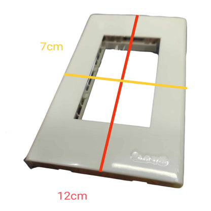 A white rectangular electrical wall plate frame shown on a white background with overlaid dimension lines and text indicating 7cm width and 12cm depth.