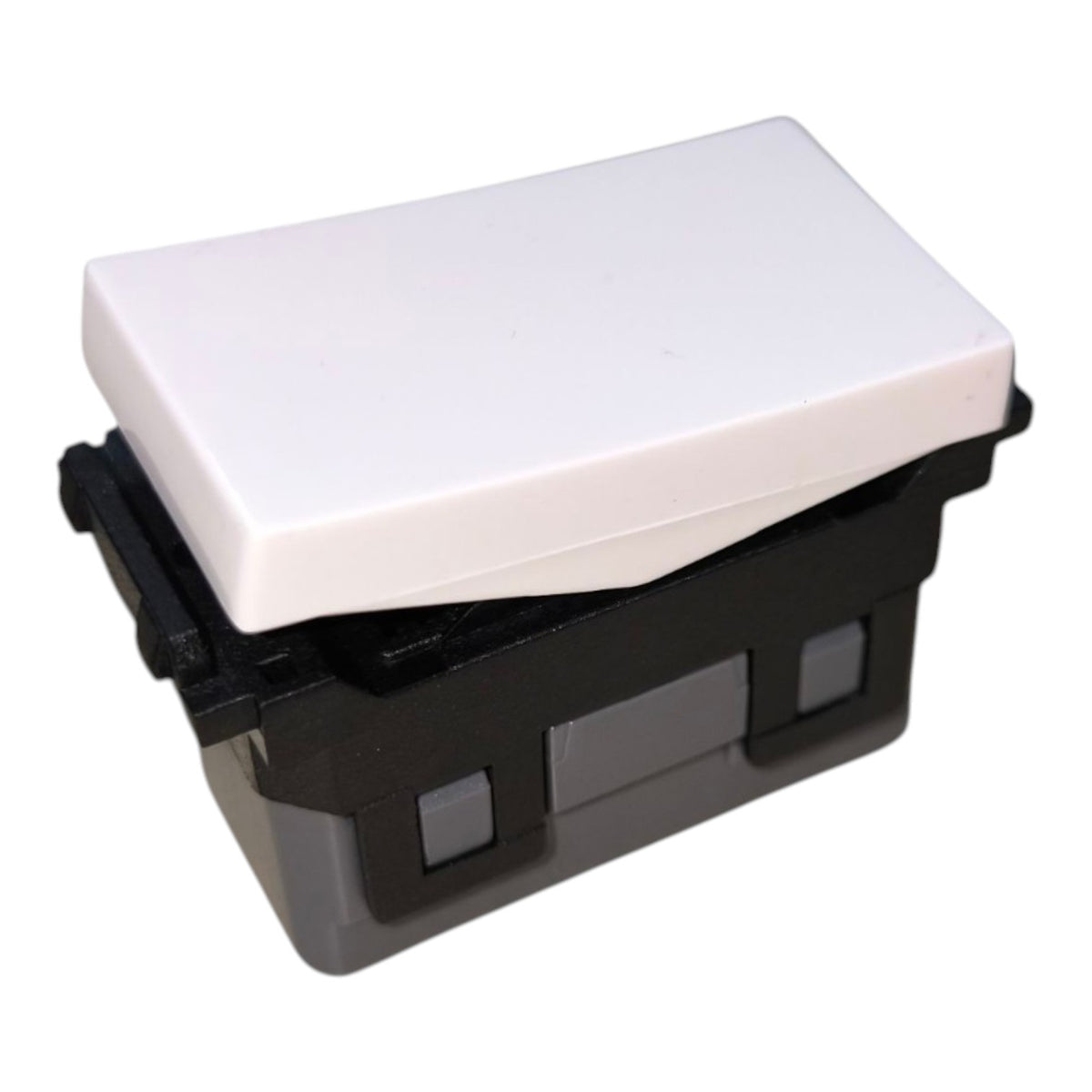 A single-button electrical switch with a white plastic top cover and a black and gray plastic base, shown on a plain white background.