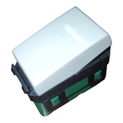 A single rectangular light switch with a white top cover, black side housing, and green front details, isolated on a white background.