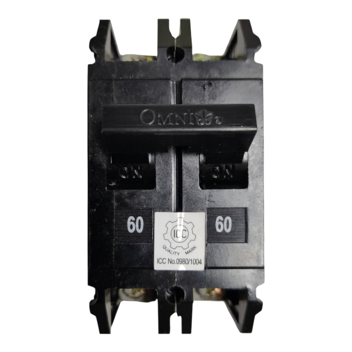 A black Omnitel 20A electrical circuit breaker with a white ICC Quality Mark sticker on the front, isolated on a white background.