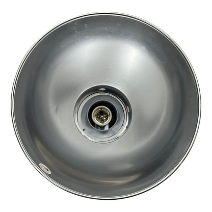 A top-down view of a metallic silver dome-shaped light fixture or reflector with a central socket, isolated on a white background.
