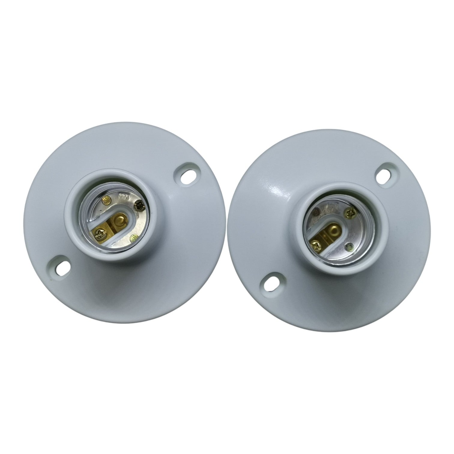 Two white light socket covers with gold contacts on a white background