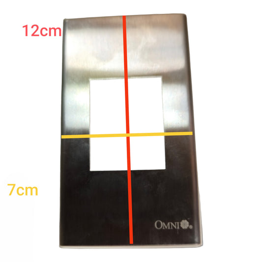 A rectangular brushed-metal wall plate or cover with a square cutout in the center, shown on a white background with red and yellow measurement lines and text indicating 12cm height and 7cm width. The brand name OMNI is visible near the bottom right.