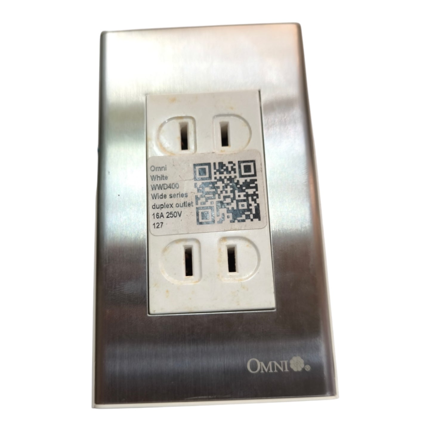 An Omni White WMD450 duplex outlet featuring a brushed stainless steel faceplate and white outlets, shown on a plain white background.