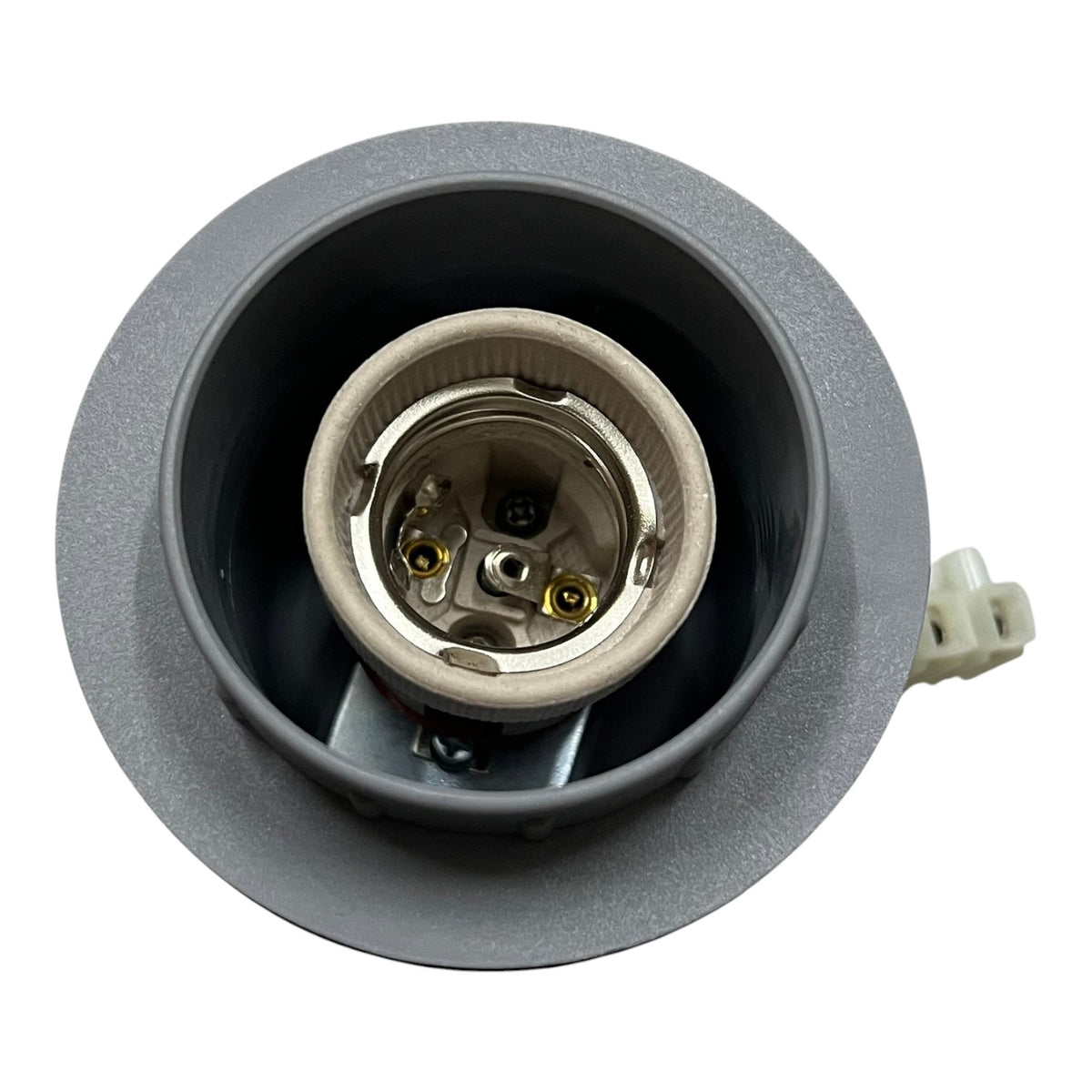 A close-up of a circular gray electrical or plumbing fitting component showing the internal metal contact points and a small white connector on the right side, isolated on a white background.