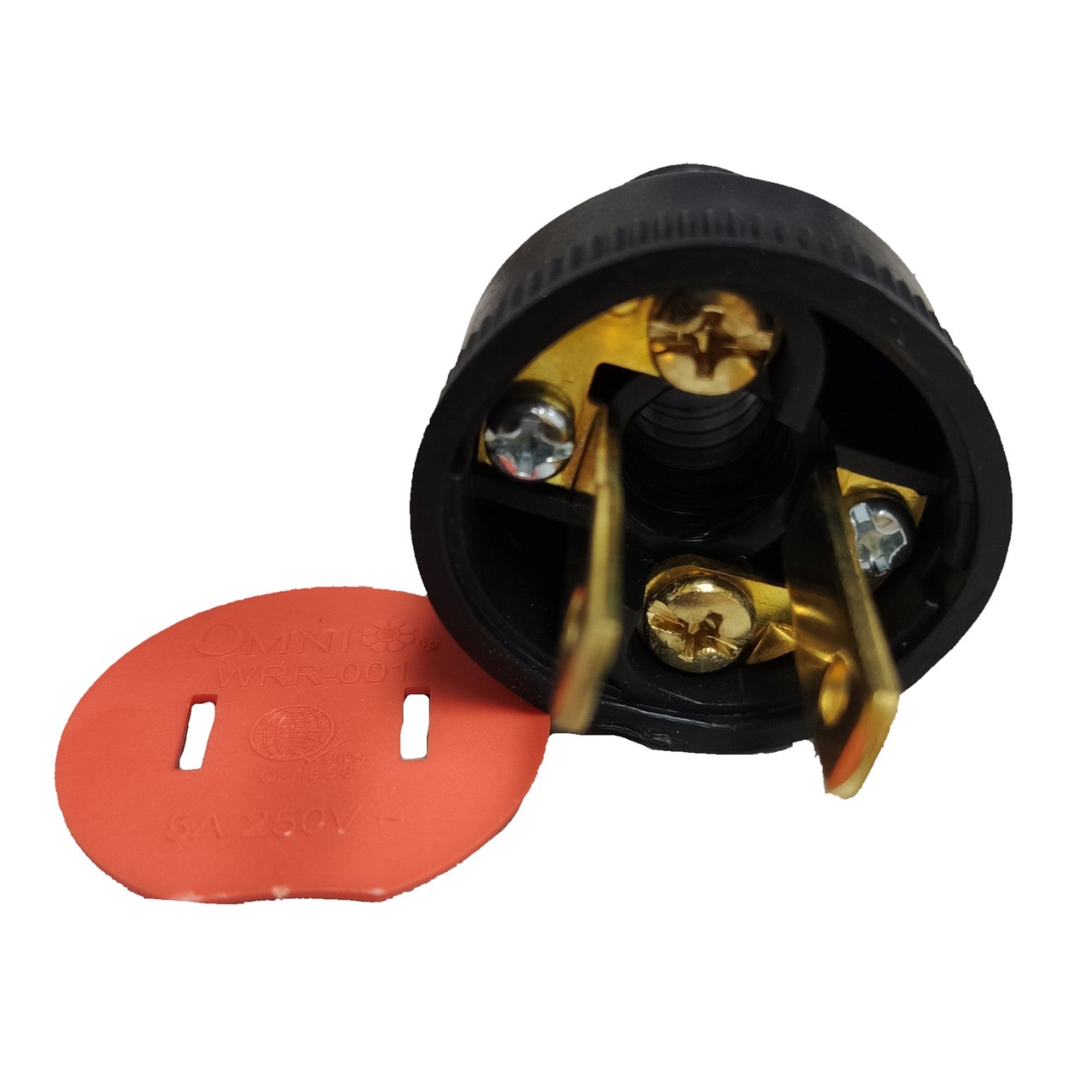 A black electrical outlet connector with gold metal terminals and a red plastic protective cover placed beside it on a white background.