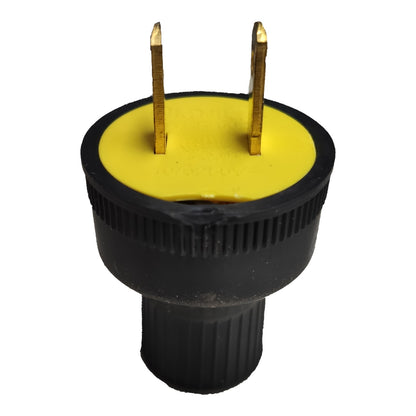 A black electrical outlet adapter plug with a yellow top and gold-colored metal prongs, isolated on a white background.