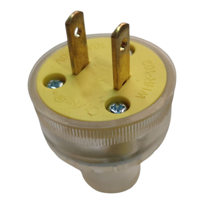 A two-pin electrical plug adapter with a translucent beige plastic body, a yellow top insulator, and brass-colored metal prongs, shown on a white background.