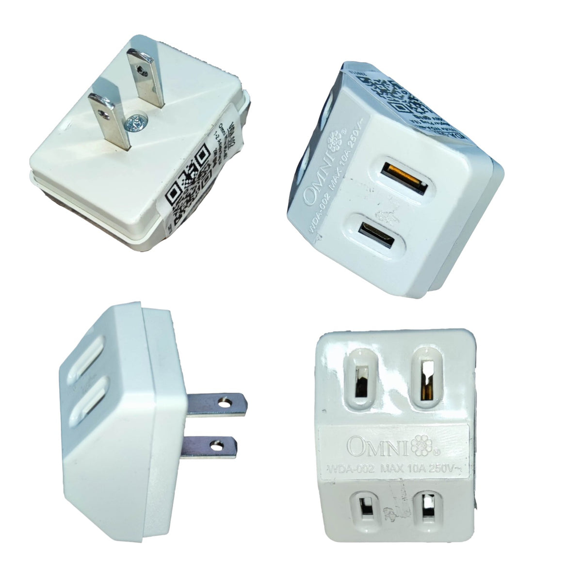 Four views of a white Omni travel plug adapter with USB charging ports, shown on a plain white background.