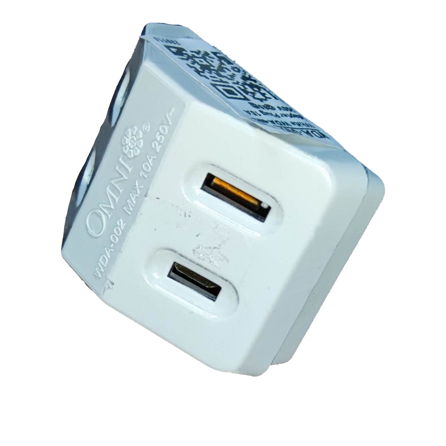 A white OmniTravel 6-pin UK wall plug adapter with two USB-C ports, featuring a QR code and brand name printed on its side, isolated on a white background.