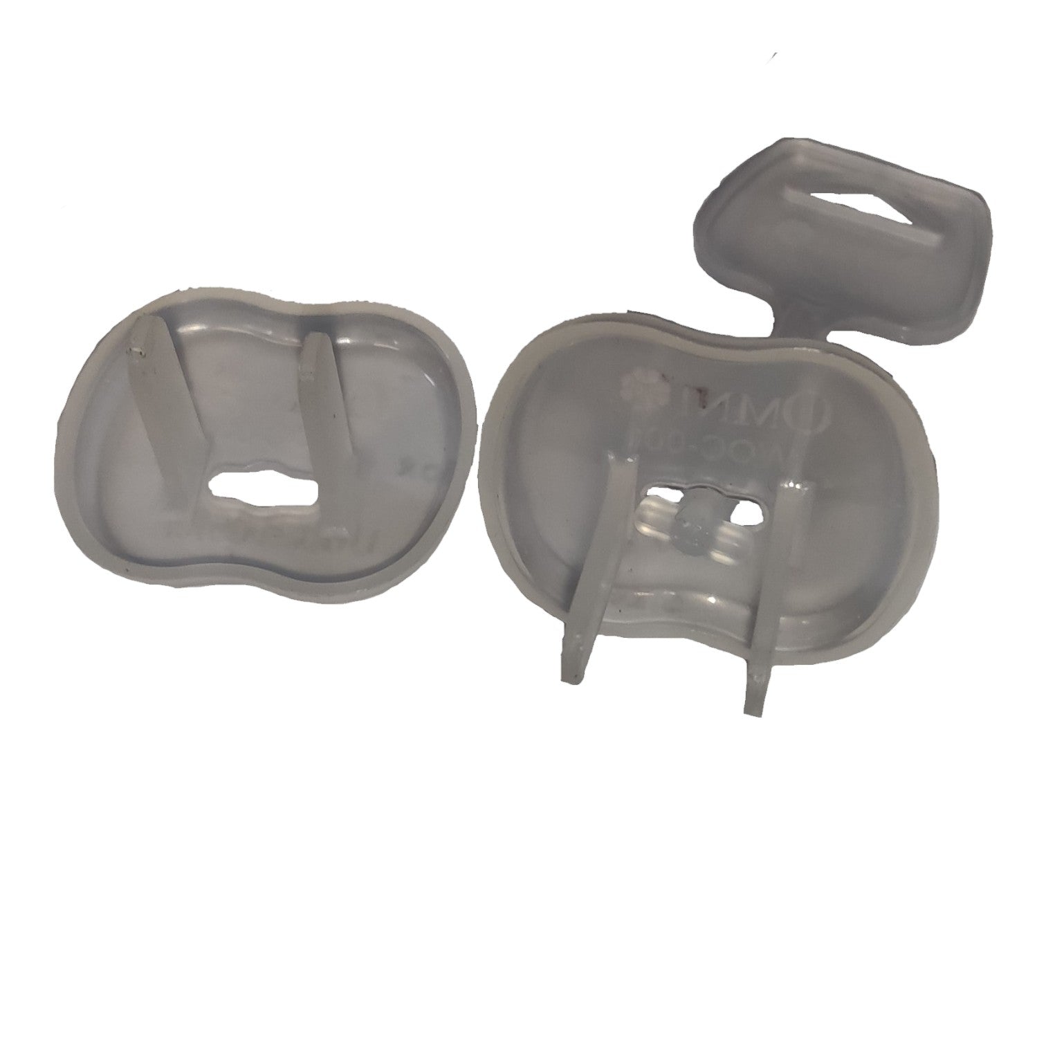 Two translucent gray plastic dental impression trays shown on a plain white background, one closed and one open to reveal the internal mold channels.