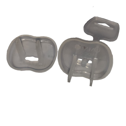 Two translucent gray plastic dental impression trays shown on a plain white background, one closed and one open to reveal the internal mold channels.