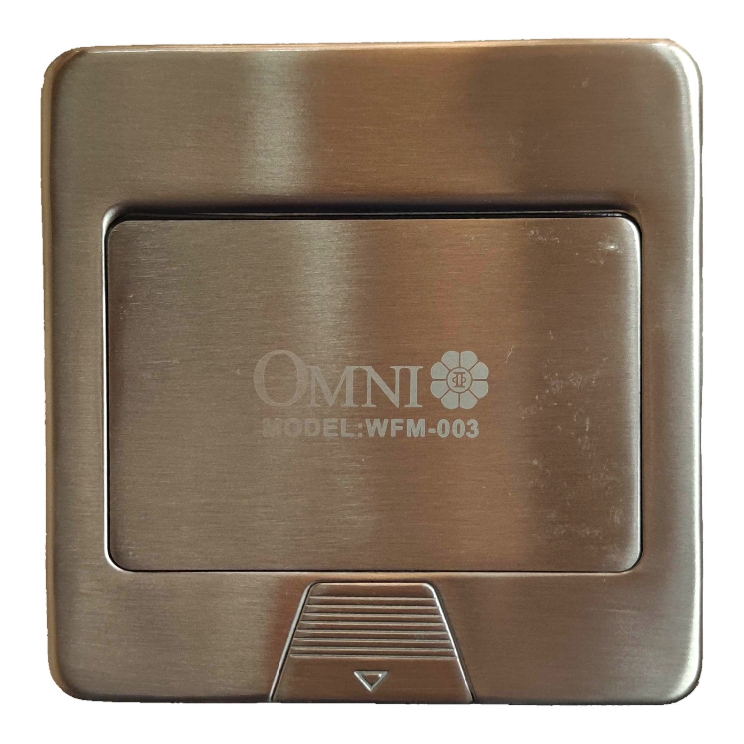 A brushed metal wall switch plate in a warm bronze finish, featuring the brand name 'OMNI' and model 'WFM-003' printed in the center, with a recessed panel and a small triangular control tab at the bottom.