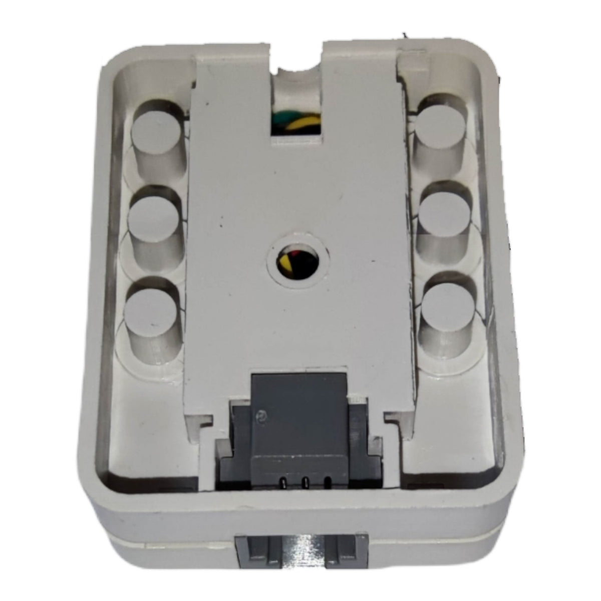 A white plastic electrical junction box or socket cover with six circular screw terminals on each side, a central hole, and a dark gray connector at the bottom, isolated on a white background.