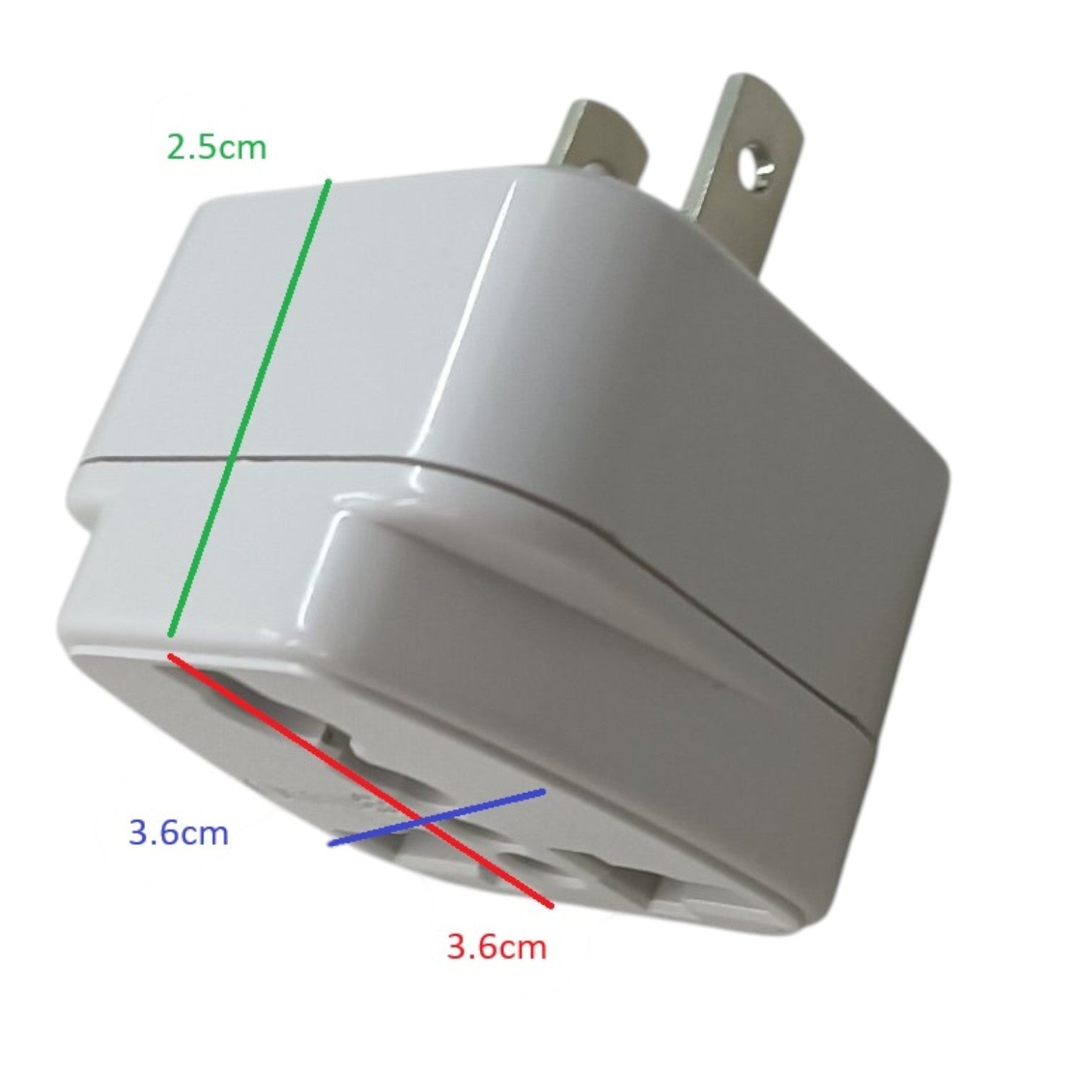 A white wall charger plug shown on a light gray background with overlaid dimension lines and text indicating measurements of 2.5 cm, 3.