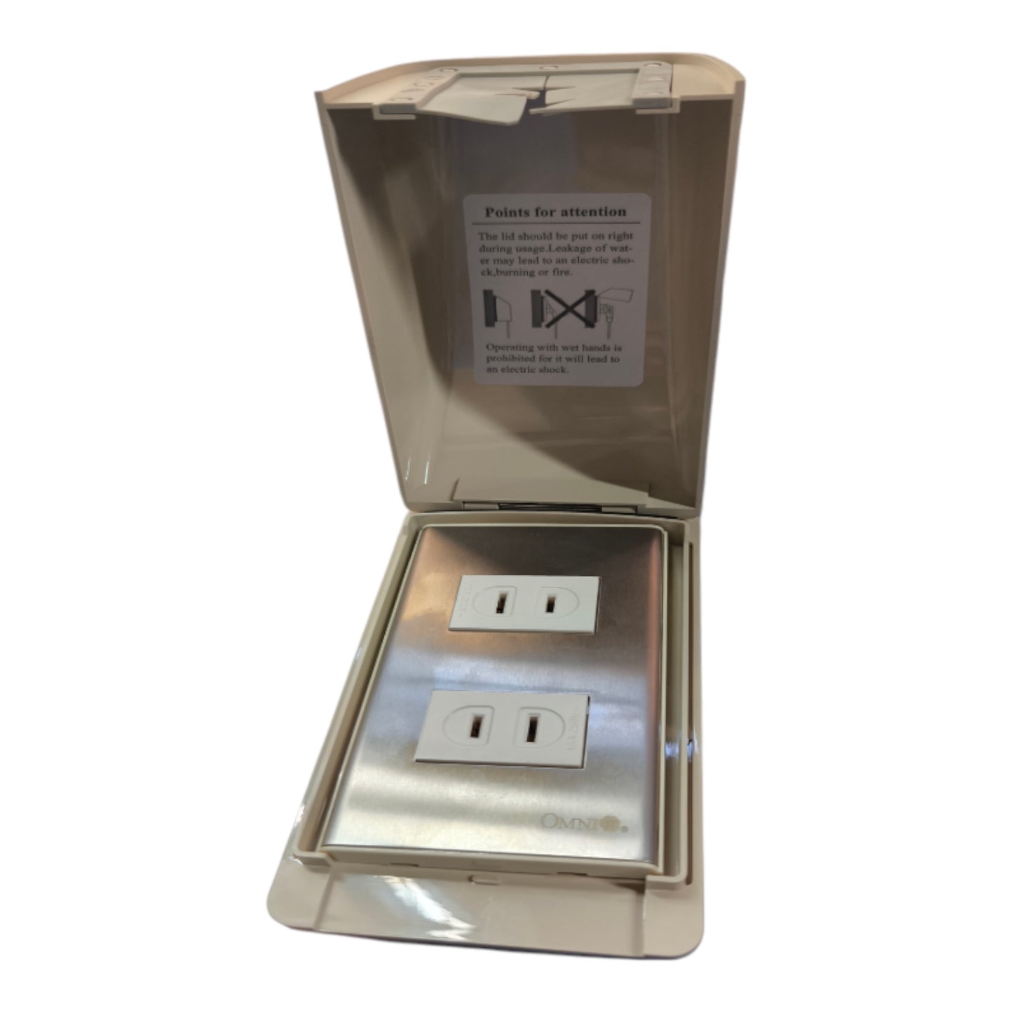 A waterproof outdoor duplex outlet box with a hinged lid, shown open on a white background. The interior features a stainless steel plate with two GFCI-style outlets, and a white safety label with points for attention is visible inside the lid.