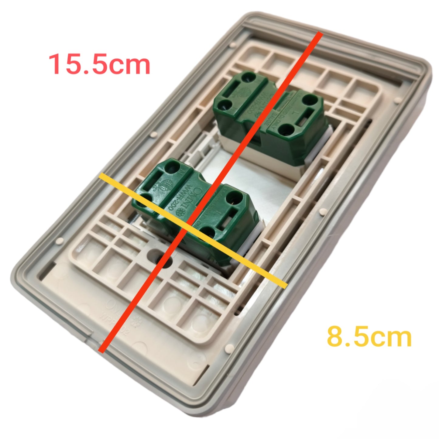 A dual electrical outlet cover plate shown on a white background with red and yellow measurement lines and text indicating dimensions 15.5cm and 8.