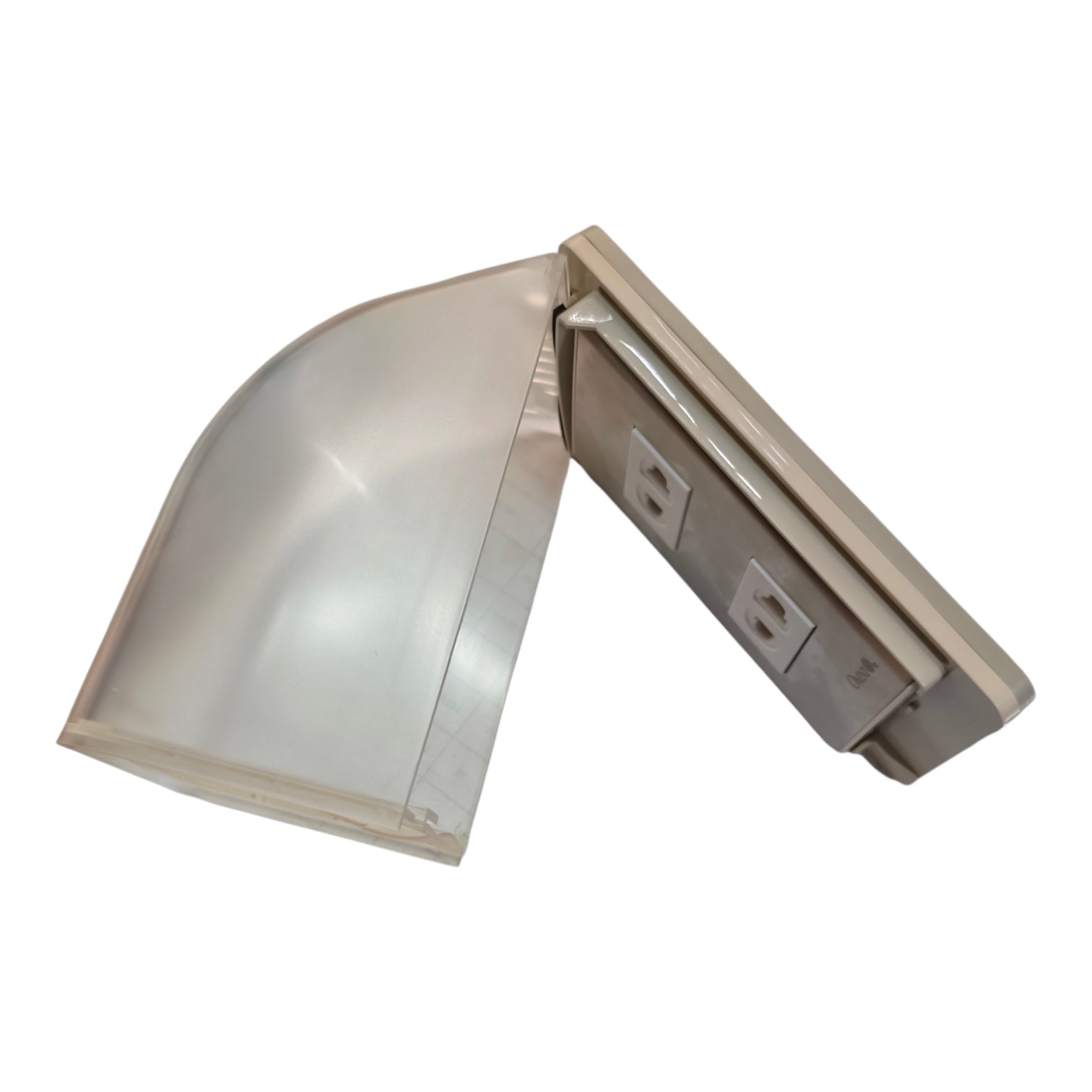 A wall-mounted industrial light fixture with a clear curved dome reflector and a beige metal housing containing two electrical outlets, shown on a plain white background.