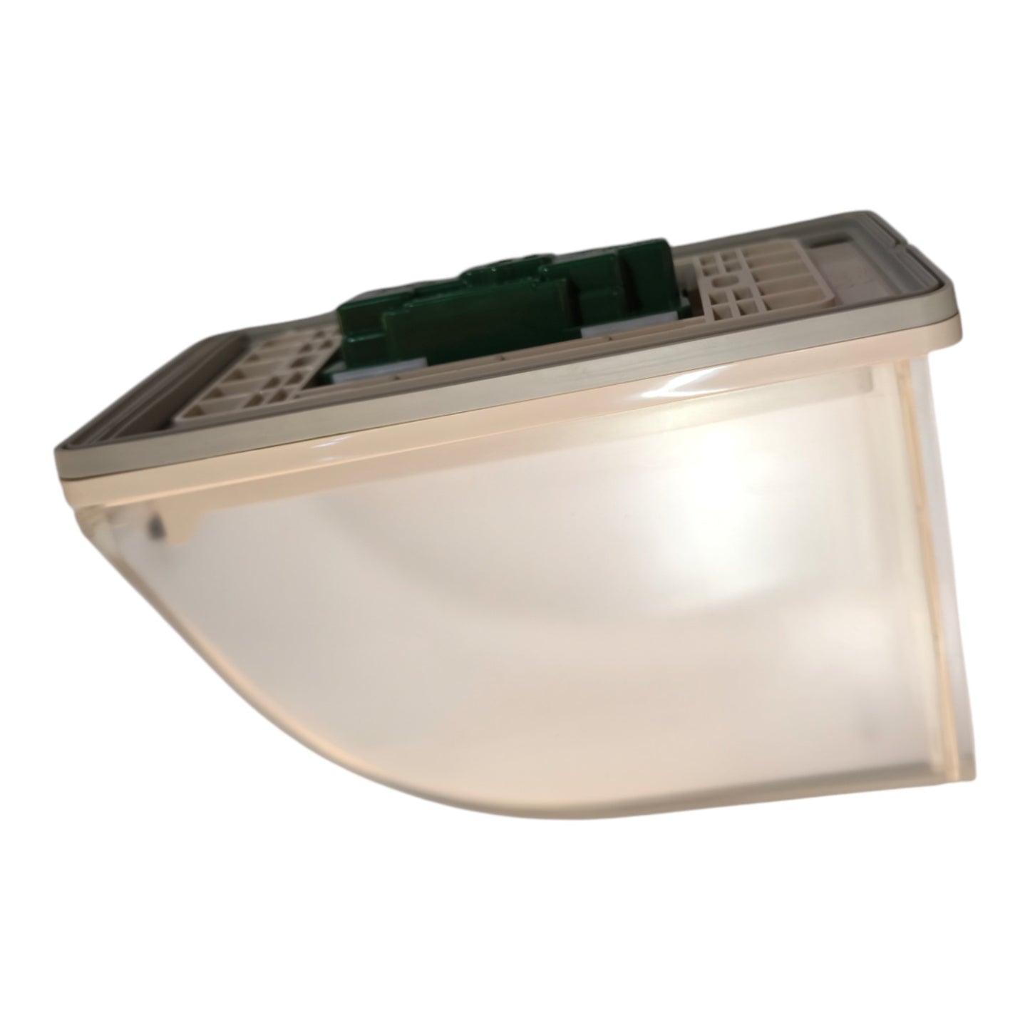 A translucent white plastic automotive light housing with a gray top trim and a green internal component visible at the top, isolated on a white background.