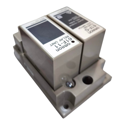 An Omron 61F-11 relay unit module with a beige plastic housing and two labeled front panels, shown on a plain white background.