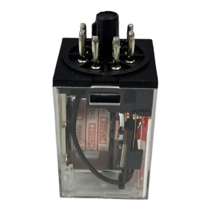 A clear plastic-wrapped electrical relay with a black top housing metal terminals and internal wiring visible through the transparent casing, shown on a plain white background.