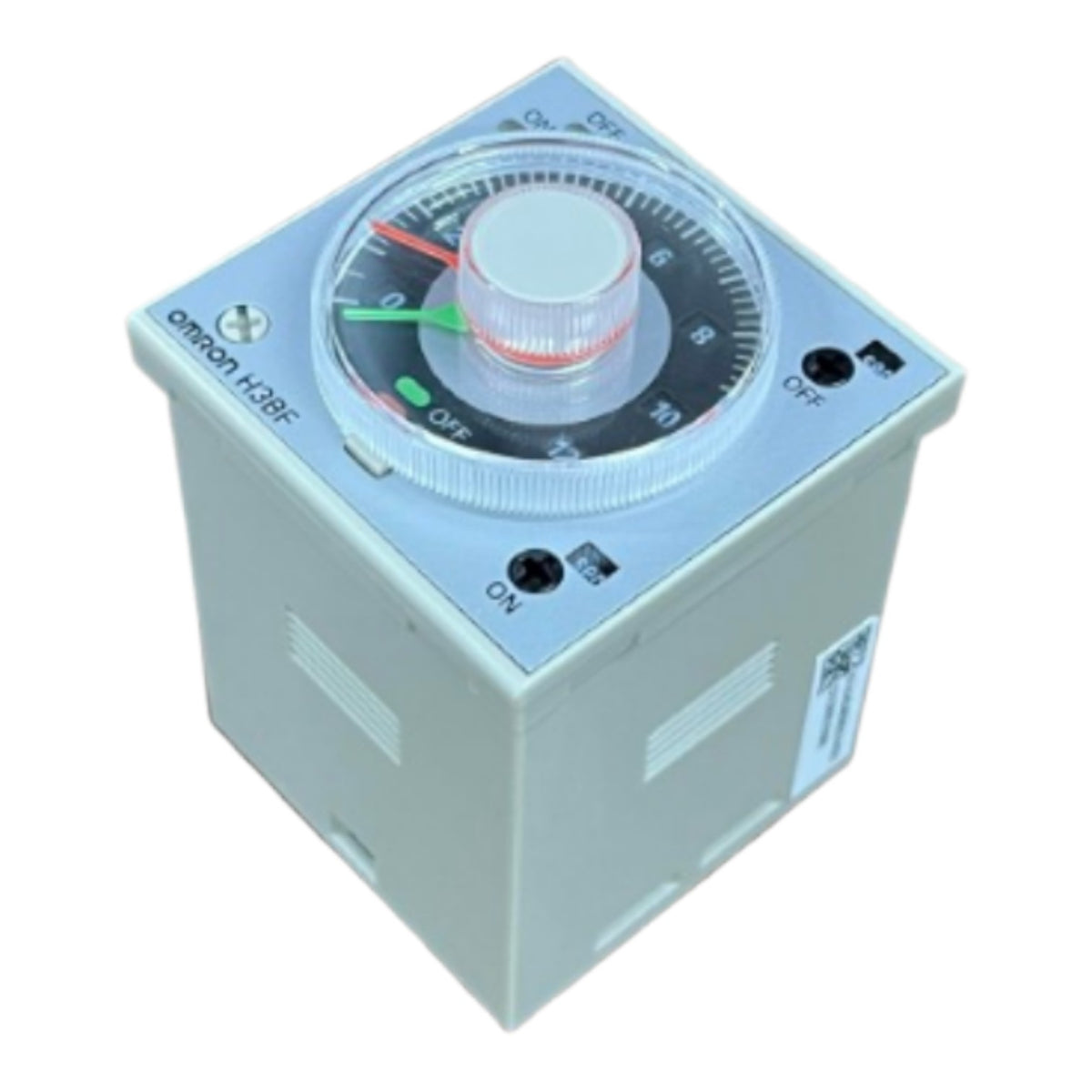 An Omron H-LOGF timed electrical contact module with a square gray plastic housing, featuring a circular dial with a red, green, and white pointer on a light gray background.