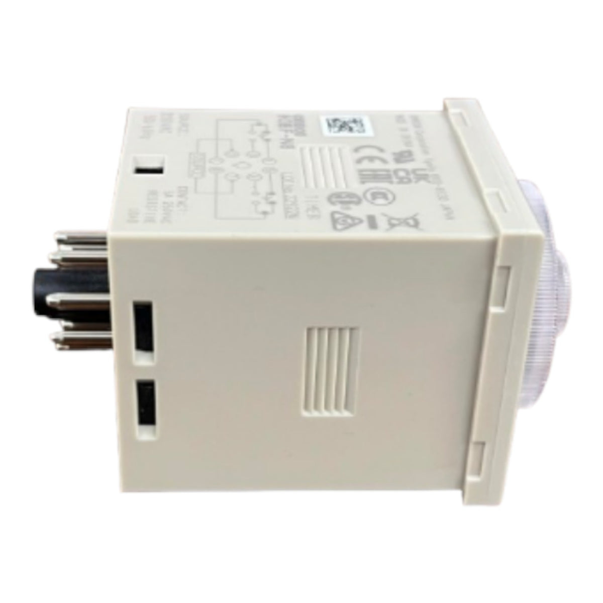 An industrial electrical contact relay or timer module with a beige plastic housing, a black multi-pin connector on the left, and a translucent white circular component on the right, shown against a plain white background.