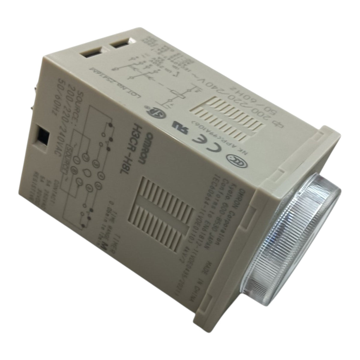 An Omron HSCR-HBL electrical contact module, model 70-00-002-24010-4, featuring a beige plastic housing with printed technical specifications and a clear ribbed lens over the contact point, shown on a white background.