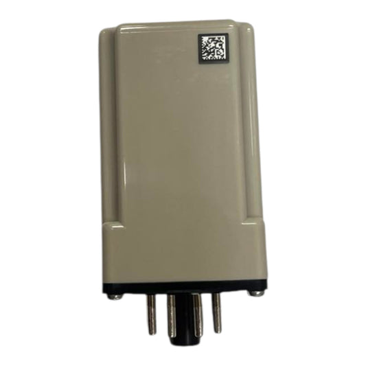 A beige-gray rectangular electronic device with a black base and multiple metal pins extending downward, shown against a plain white background.