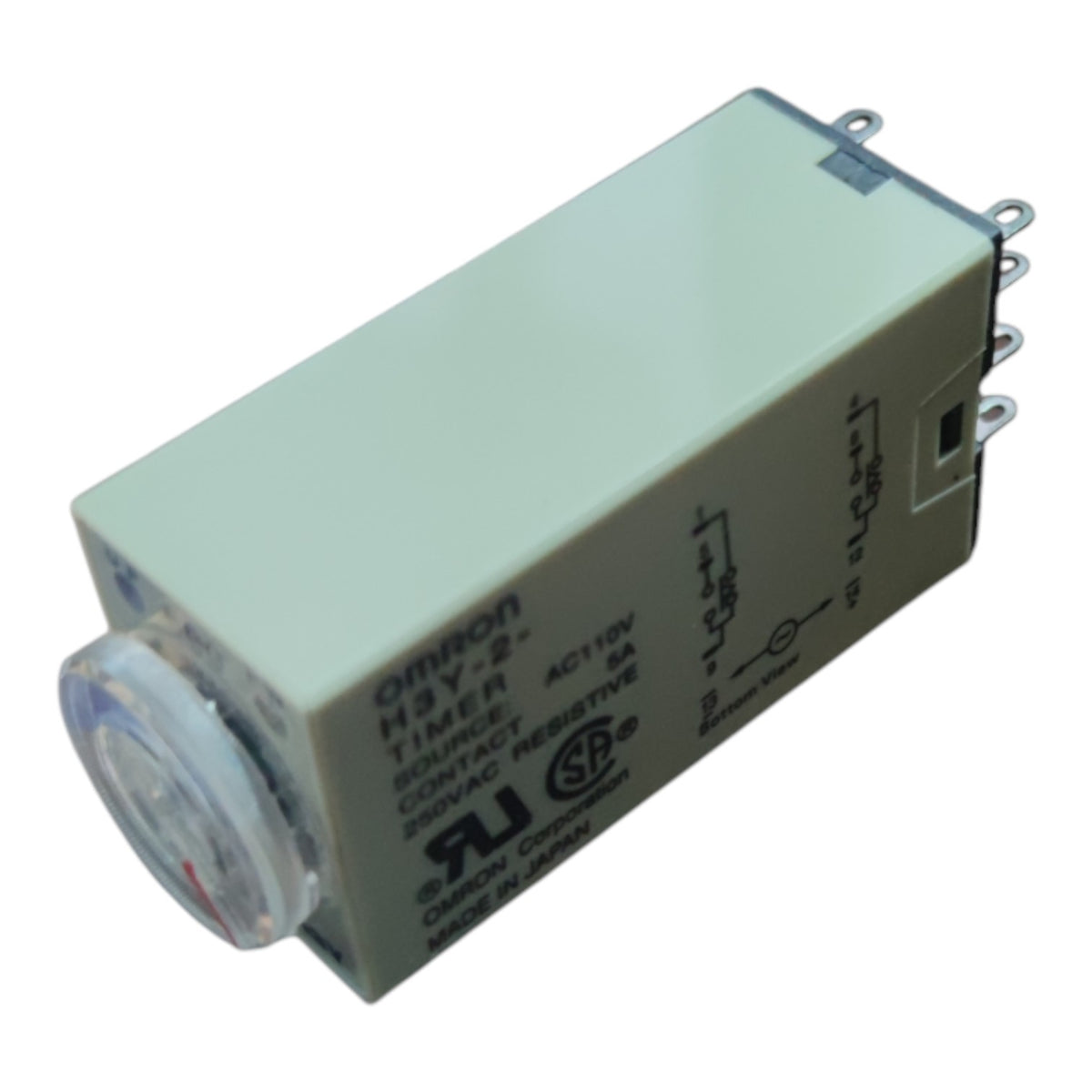 An Omron HJY-2 AC 110V contact timer relay with a beige plastic housing, a clear circular lens on the front, and silver metal terminal pins on the side, shown on a white background.