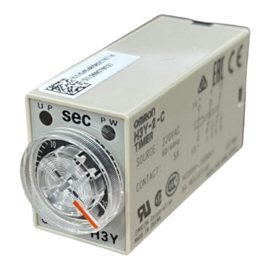 An Omron H3Y-2-C analog timer module, model H3Y-2-C, featuring a beige plastic housing, a clear circular dial window showing a black index dial, and an orange indicator arrow.