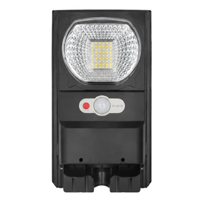 A black solar-powered LED street light with a circular clear lens, a central yellow LED chip, a red power button, and a white motion sensor button with a green brand label, isolated on a white background.