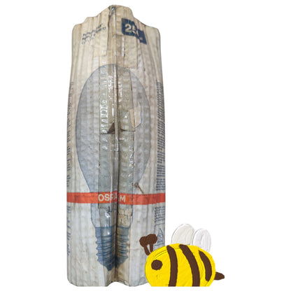 OSRAM car headlight with a bee-shaped object on a white background