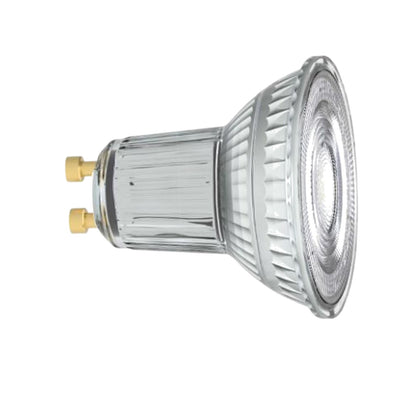 A clear glass GU10 LED spotlight bulb with a ribbed reflective interior and two gold metal contact pins on a white background.