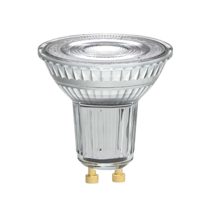 A clear glass GU10 LED spotlight bulb with a ribbed glass reflector and two gold metal contact pins at the base, shown on a plain white background.