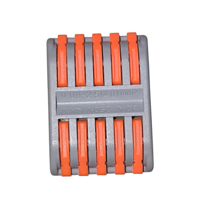 Gray and orange tool holder with multiple slots on a white background