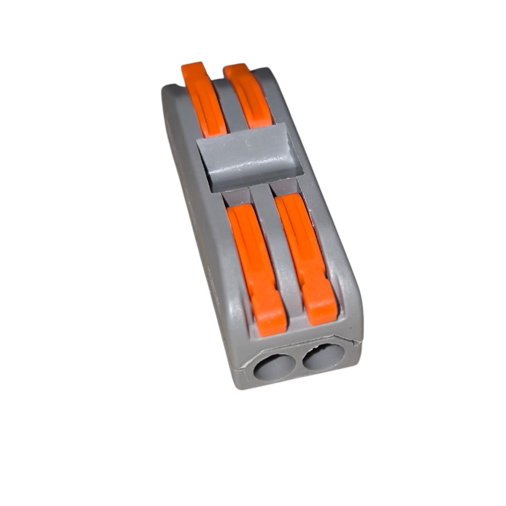 Gray plastic block with orange connectors on a white background