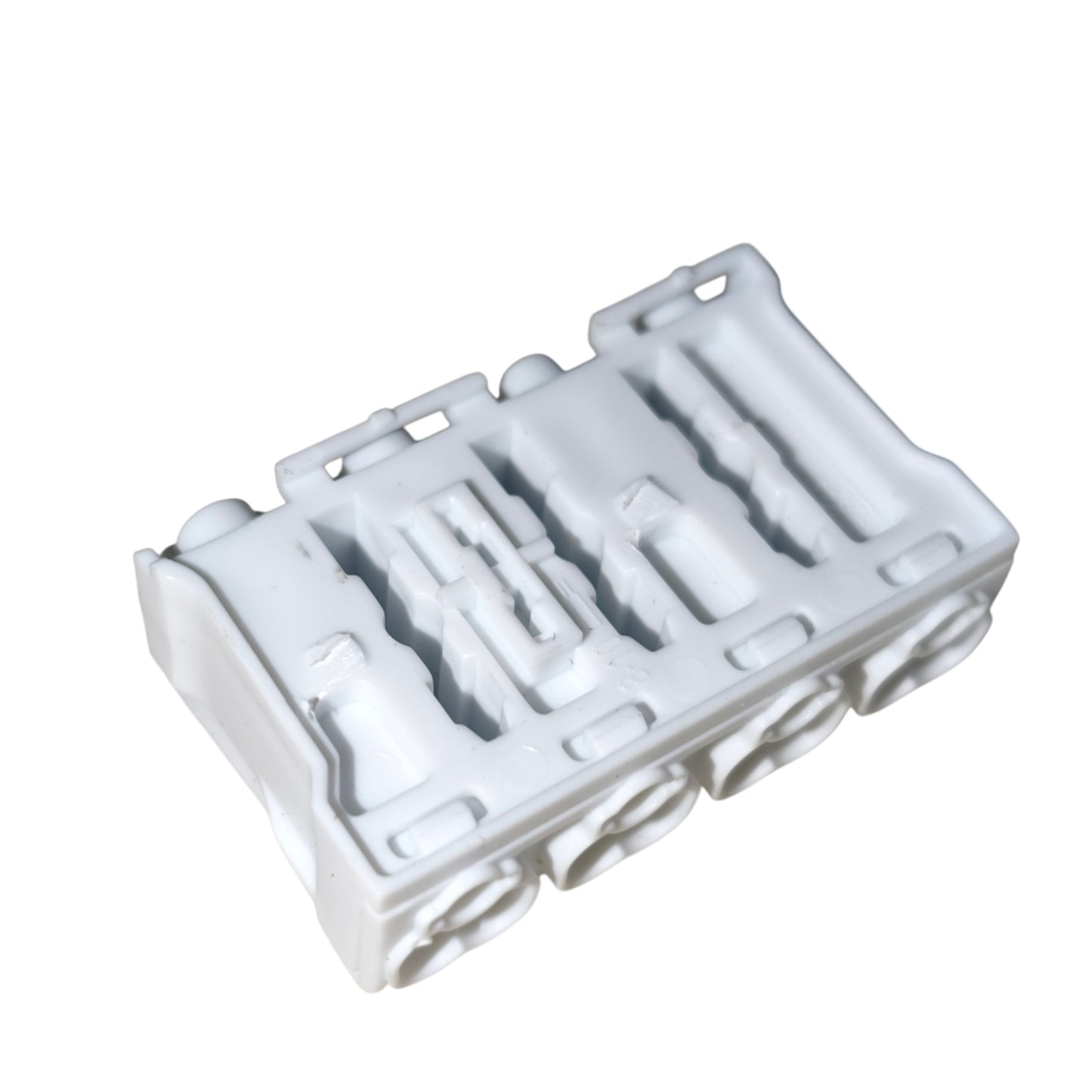 White plastic component on a white background
